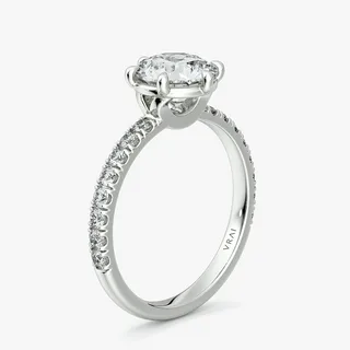What Defines an 18K White Gold Ivy Twist Pavé Engagement Ring?
